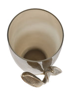 Overhead view into the empty smoked glass vessel, with the gold leaf decoration visible beside the rim.