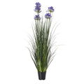 Full view of a tall artificial arrangement with narrow green foliage and blue-violet flower clusters in a tapered black pot.