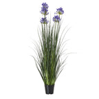Full view of a tall artificial arrangement with narrow green foliage and blue-violet flower clusters in a tapered black pot.