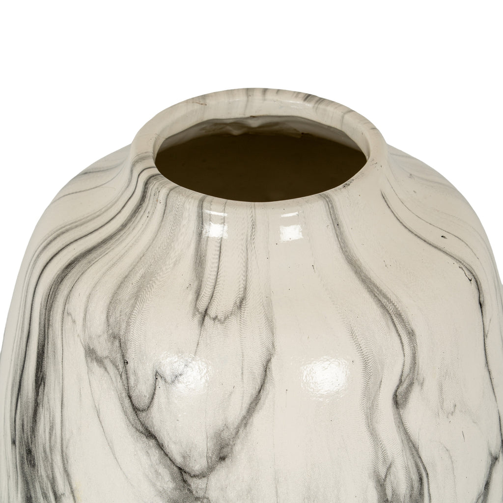 View into the round opening of the Veined Bulb Vase, showing its thick rim and veined curved shoulders.