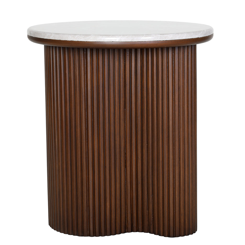 Front view of a round side table with a pale grey marble top and a curved brown pedestal with vertical fluting.