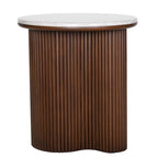 Front view of a round side table with a pale grey marble top and a curved brown pedestal with vertical fluting.