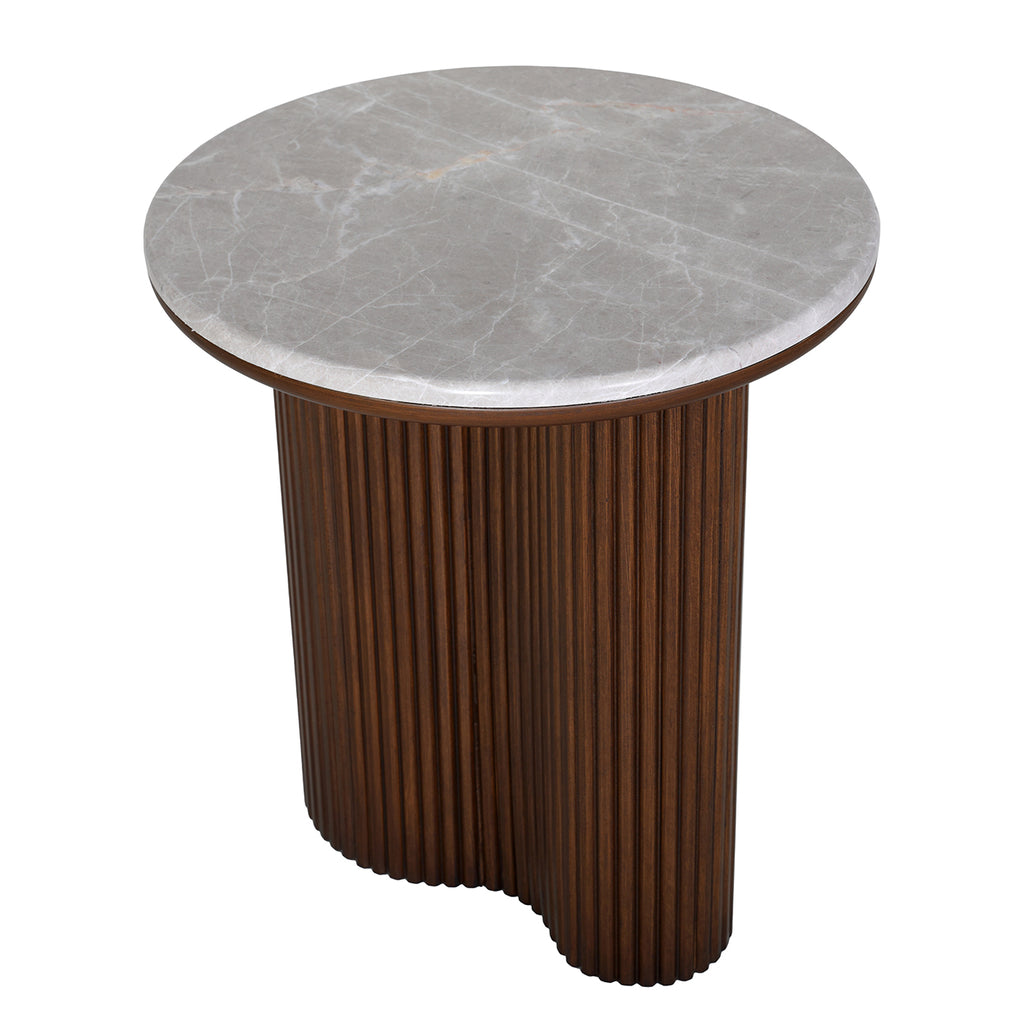 Elevated angled view showing the grey veined marble surface and the curved shape of the fluted brown pedestal.