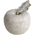 Cream-beige apple ornament on a white background, with a mottled rounded body, short stem and upright lobed leaf with raised branching veins.