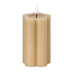 Stone-beige pillar LED candle on a white background, showing rounded vertical lobes, a shallow circular top recess and a white flame-shaped element.