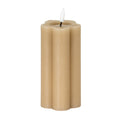 Stone-beige LED pillar candle on a white background, showing rounded vertical lobes, pale surface marks and a white flame-shaped detail above the recessed top.