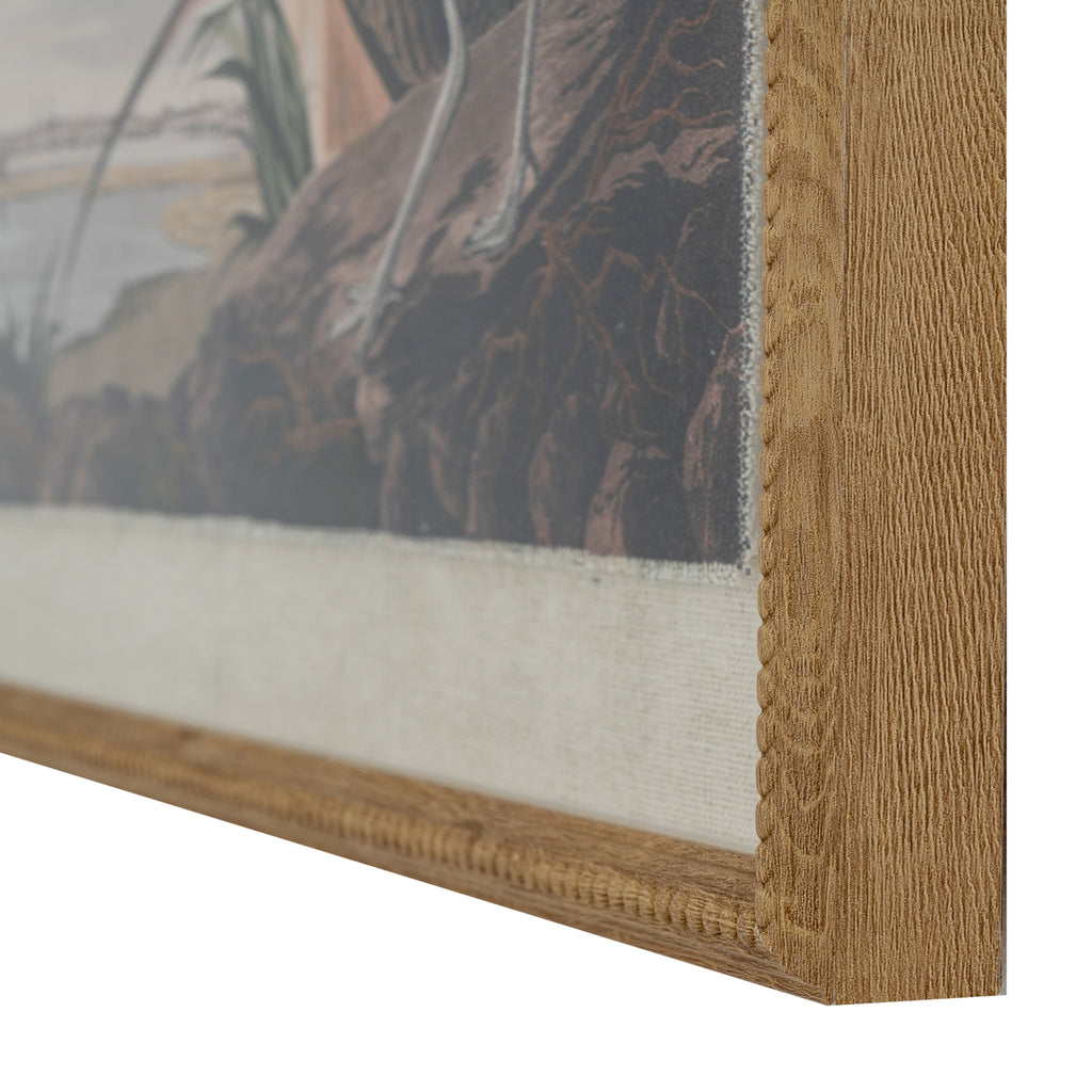 Angled close-up of the print's lower right corner, showing the grain-like frame texture, rounded beaded edge and pale surround beside the illustrated rocks.