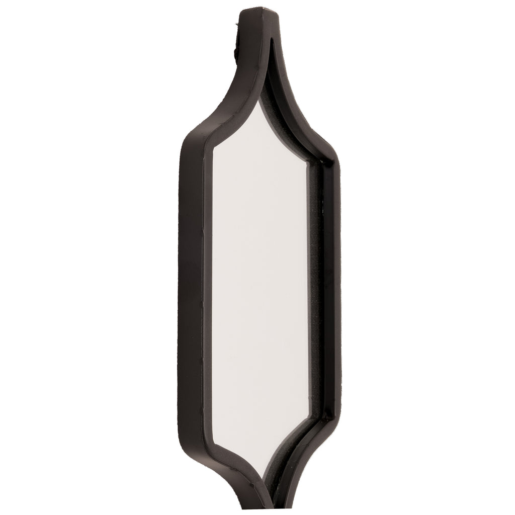 Angled close-up of a reflective panel showing the black frame curving into pointed ends.