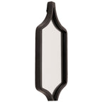 Angled close-up of a reflective panel showing the black frame curving into pointed ends.