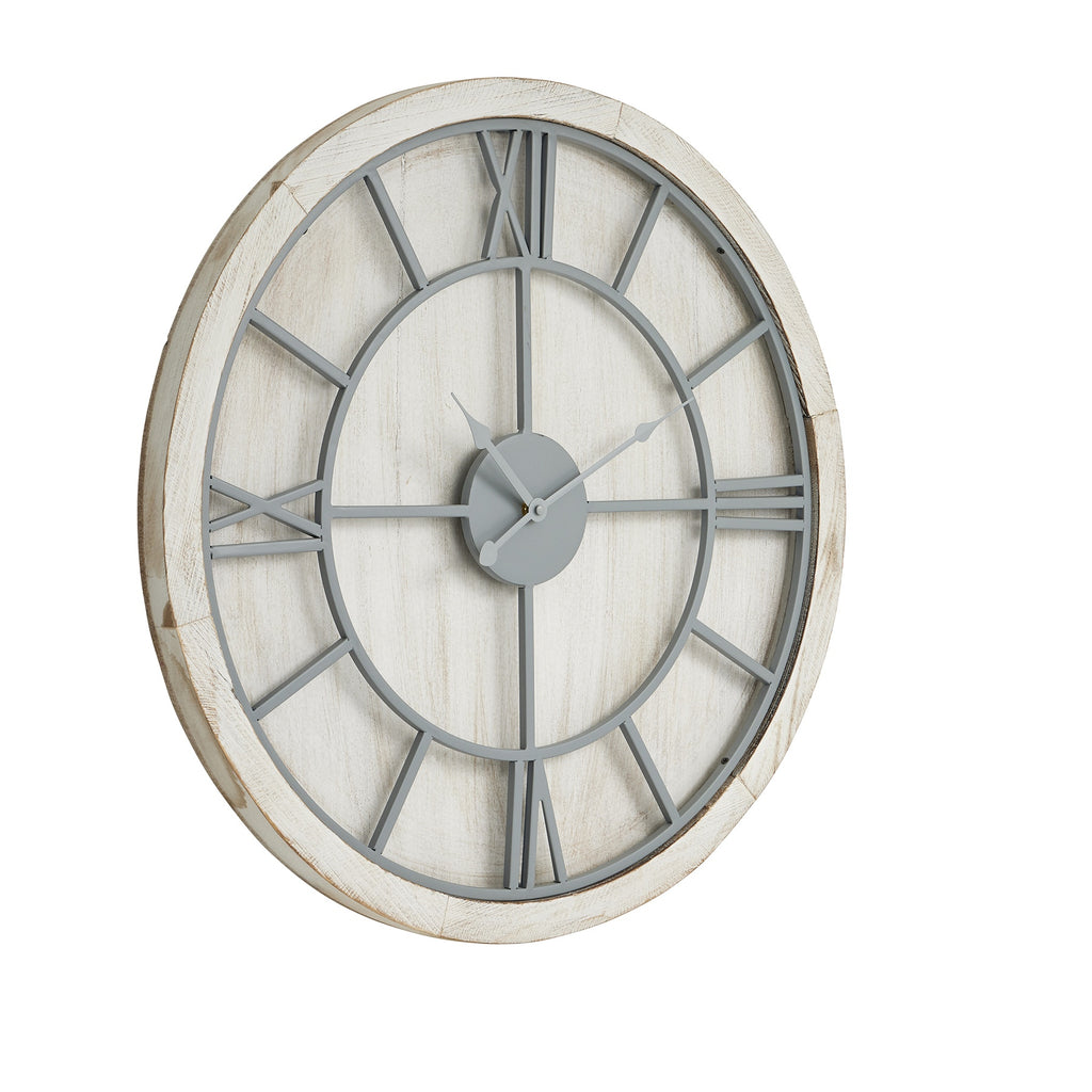 Angled view of a round whitewashed wall clock with light-grey Roman numerals, circular framework and three grey hands.