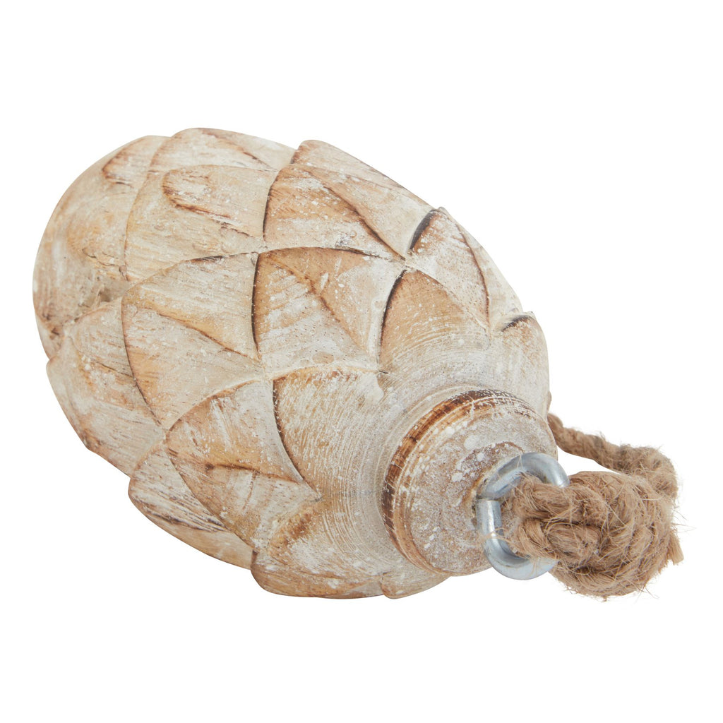 Angled close-up of the ornament's overlapping scales, showing the pale wash, darker brown edges and rope knot through a silver-coloured eye.