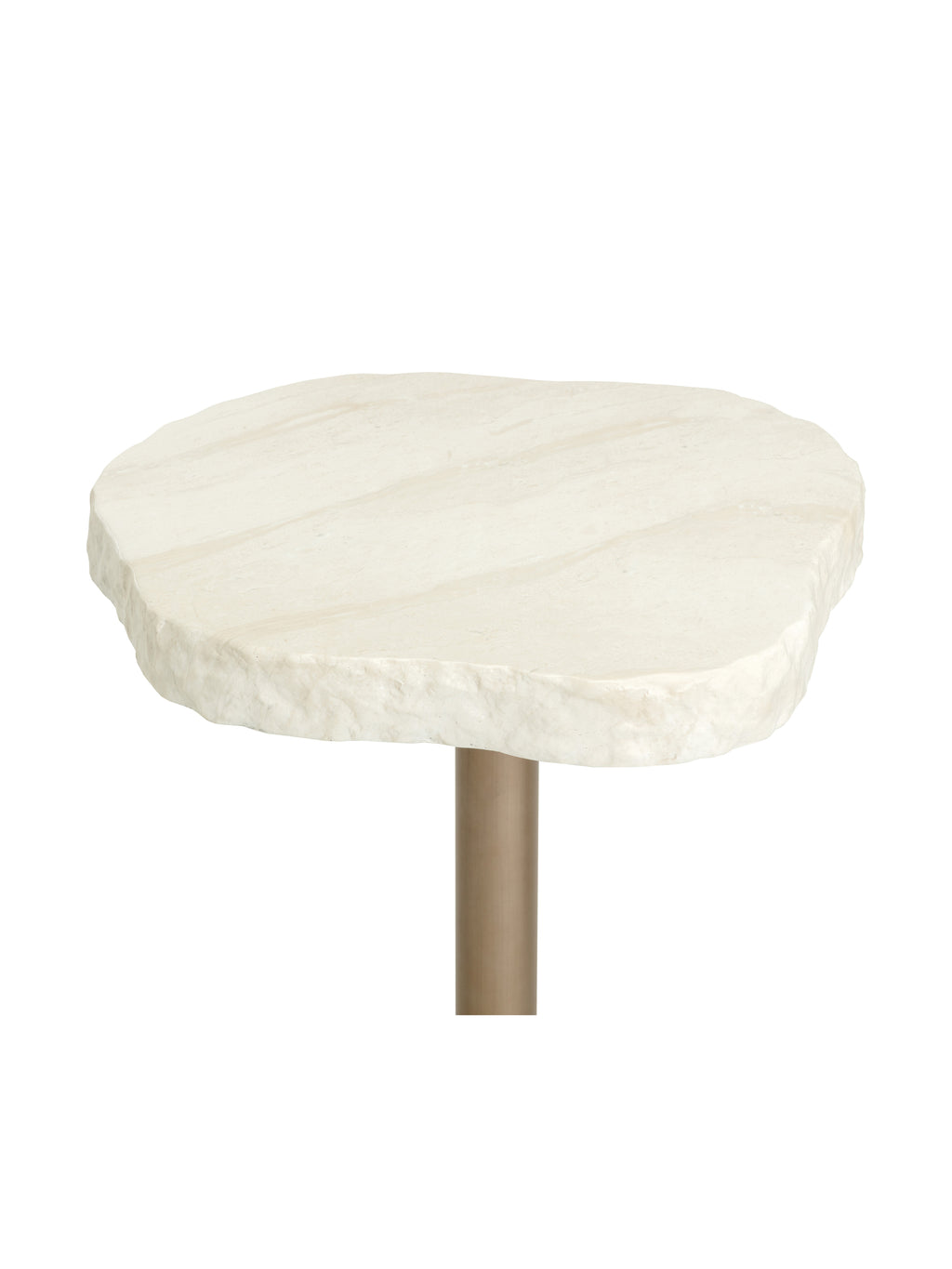 Angled close-up of the cream faux-travertine tabletop showing pale tonal markings and its uneven textured edge.