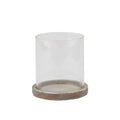 Candle lantern with a clear open cylindrical sleeve seated in a shallow mottled brown and grey base, shown against white.