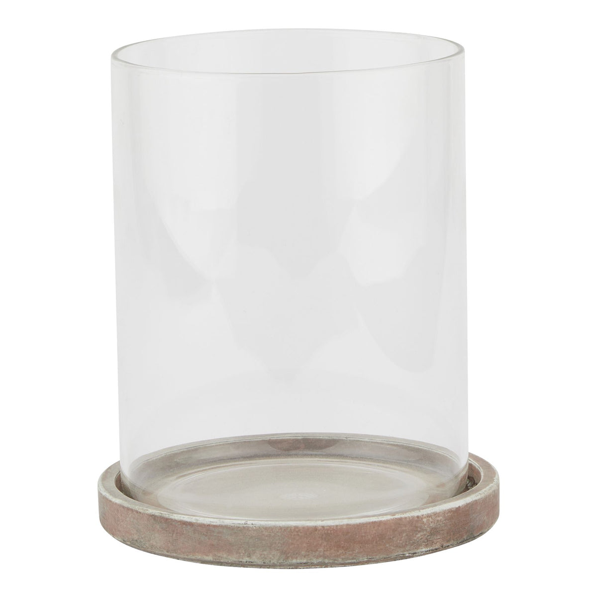 Front view of a decorative lantern with a tall clear cylindrical sleeve seated in a shallow round base with brown, grey and pale weathered markings.