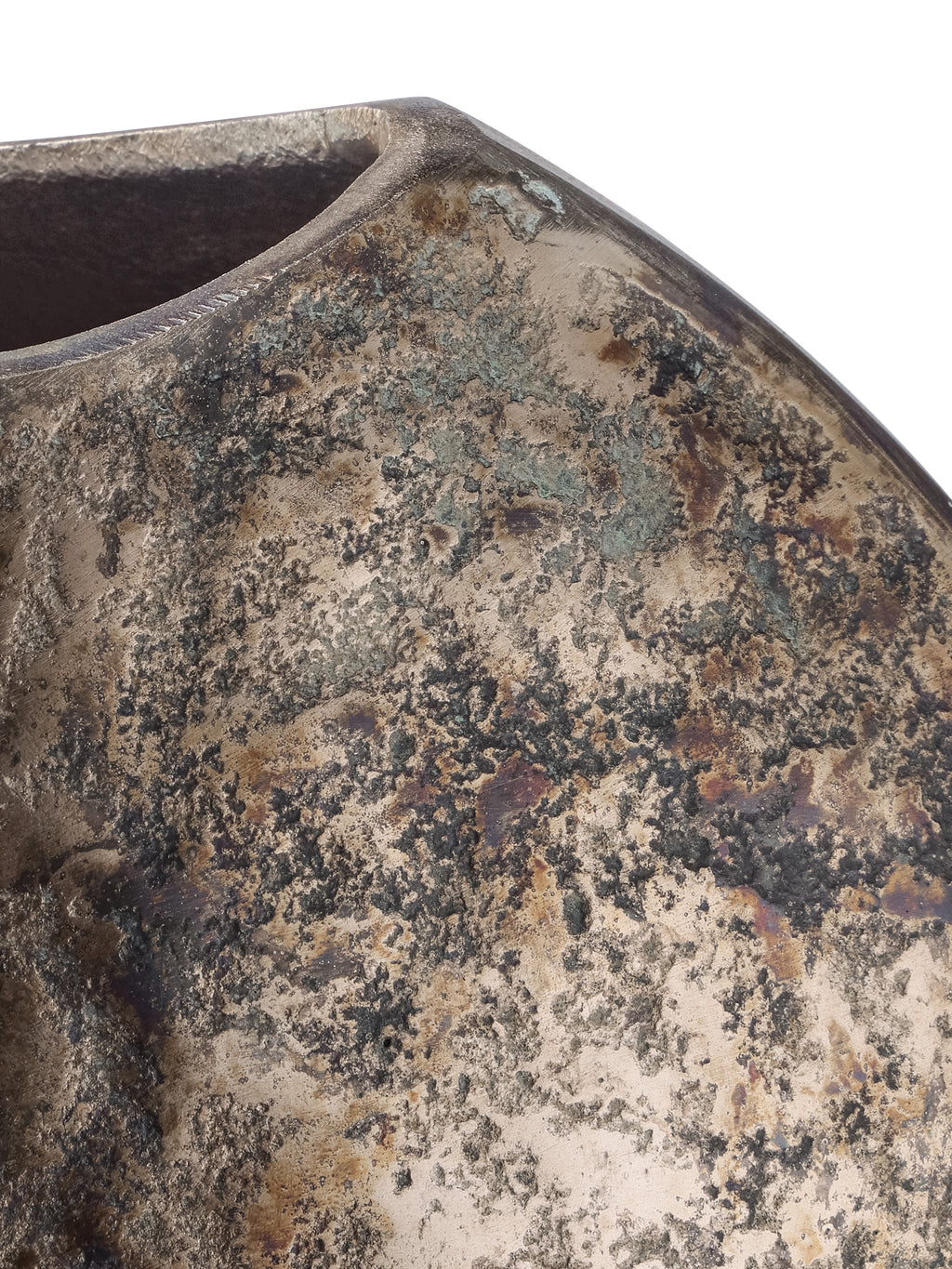 Detail of the vase shoulder and rim, showing bronze tones, dark mottling and verdigris-coloured patches.