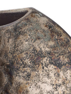 Detail of the vase shoulder and rim, showing bronze tones, dark mottling and verdigris-coloured patches.