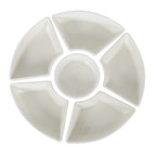 Overhead view of five warm-white wedge dishes arranged in a ring around a round bowl on a white background.