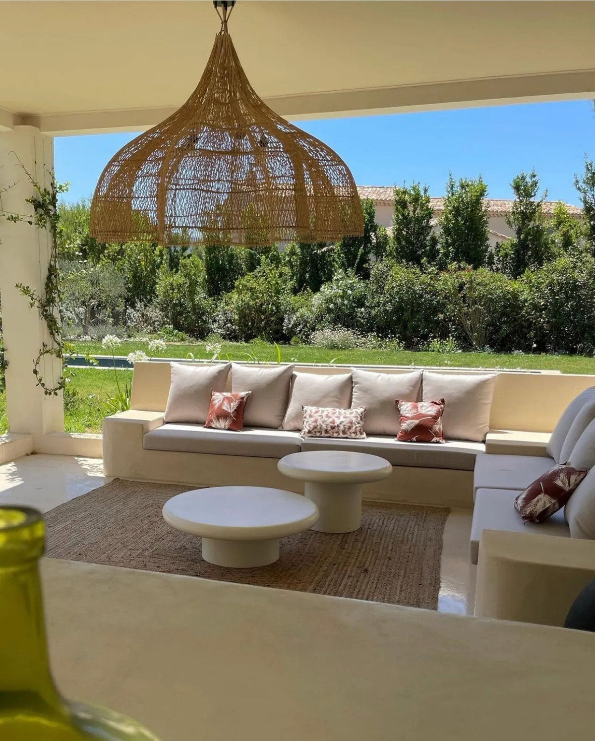 Whipped Rattan Pendant Light – Natural, Extra Large – styled above an outdoor seating area