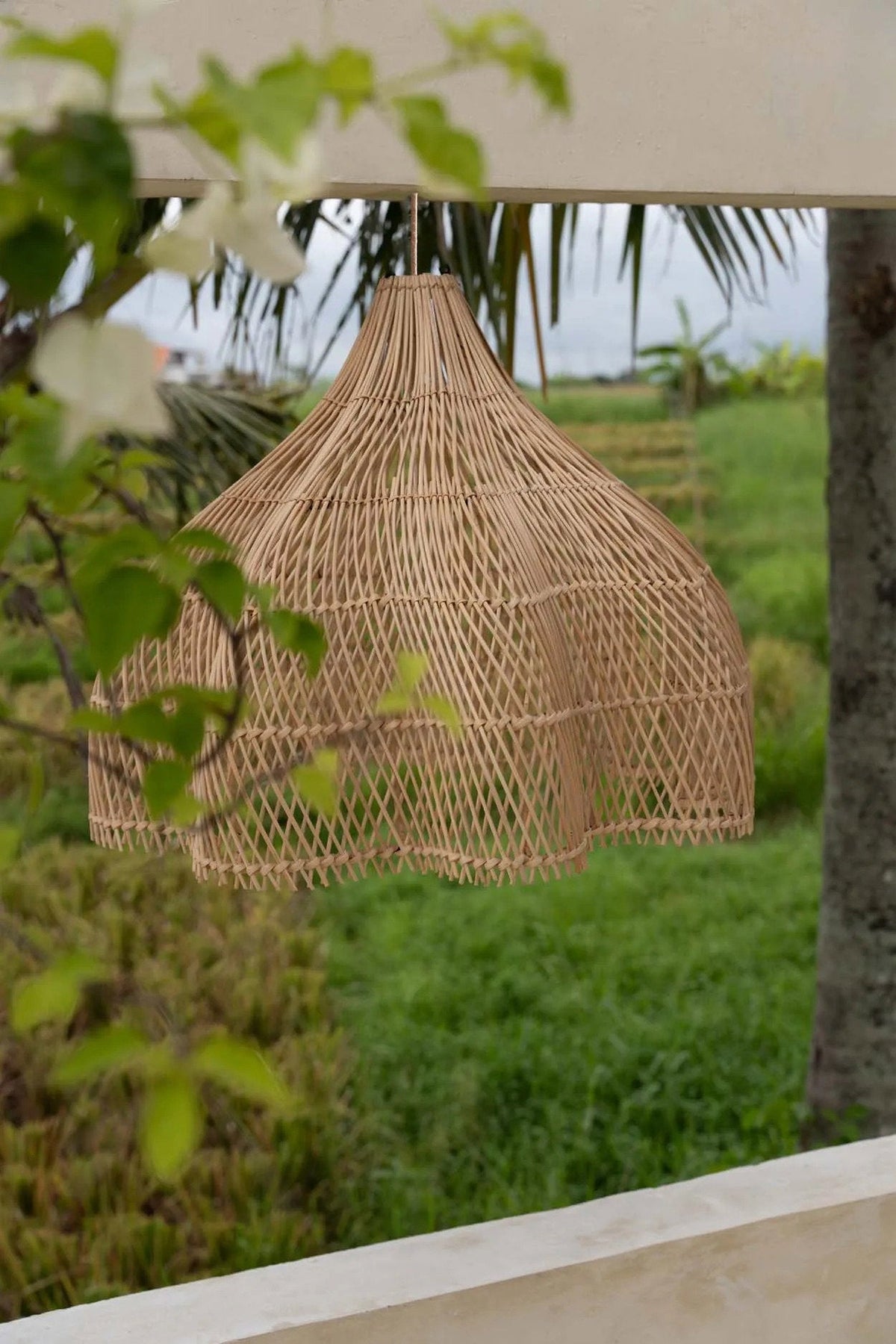 Whipped Rattan Pendant Light – Natural, Medium — outdoor-styled hanging view