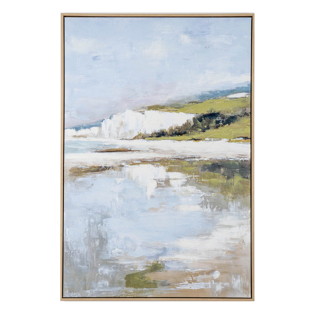 Front view of portrait artwork showing white cliffs and green coastal land beneath a pale blue sky, with loose reflections in the foreground and a narrow light wood-toned frame.
