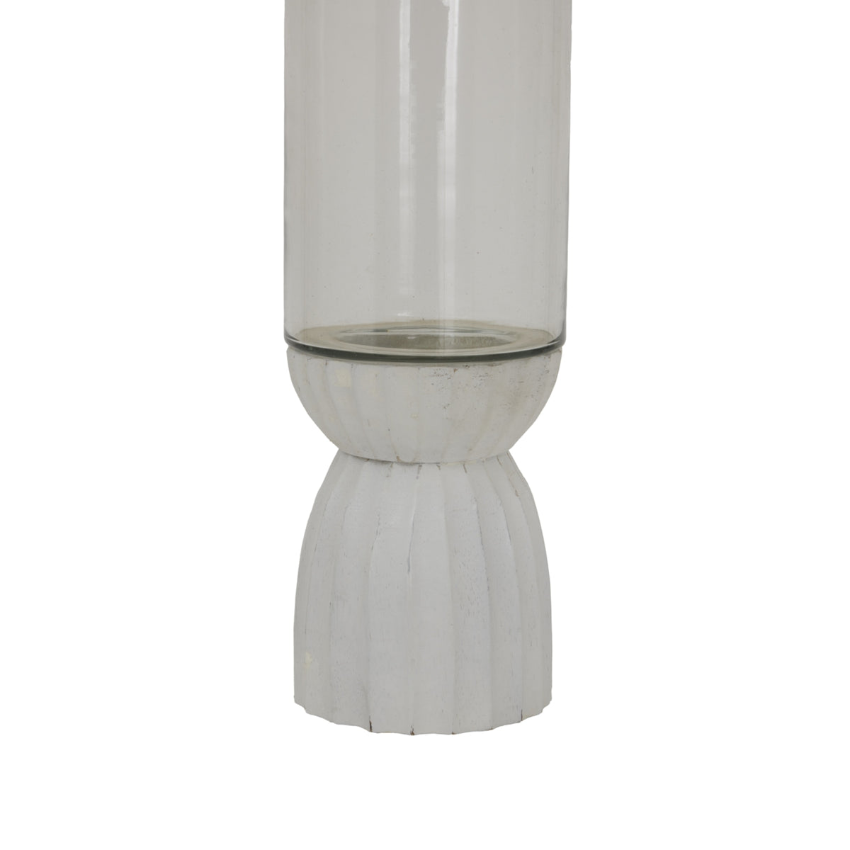 Close-up of the lantern's white ribbed base, showing its narrow waist, subtle surface markings and the lower edge of the clear shade.