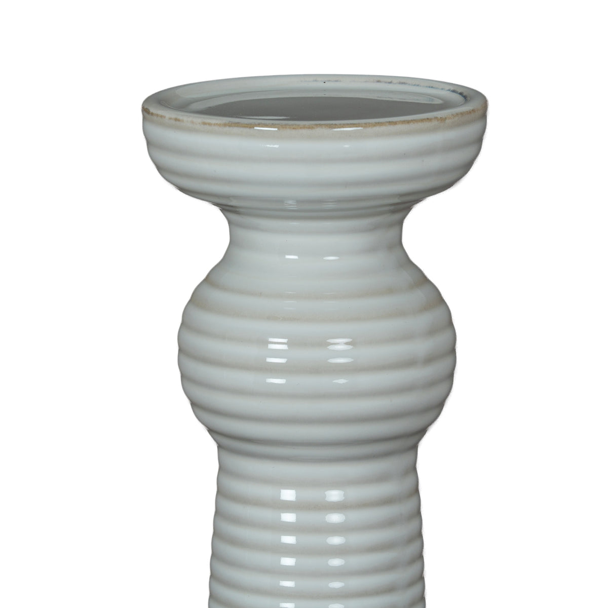 Close-up of the candle holder's broad cup and rounded upper collars, showing glossy white ribs and a faint beige line around the rim.