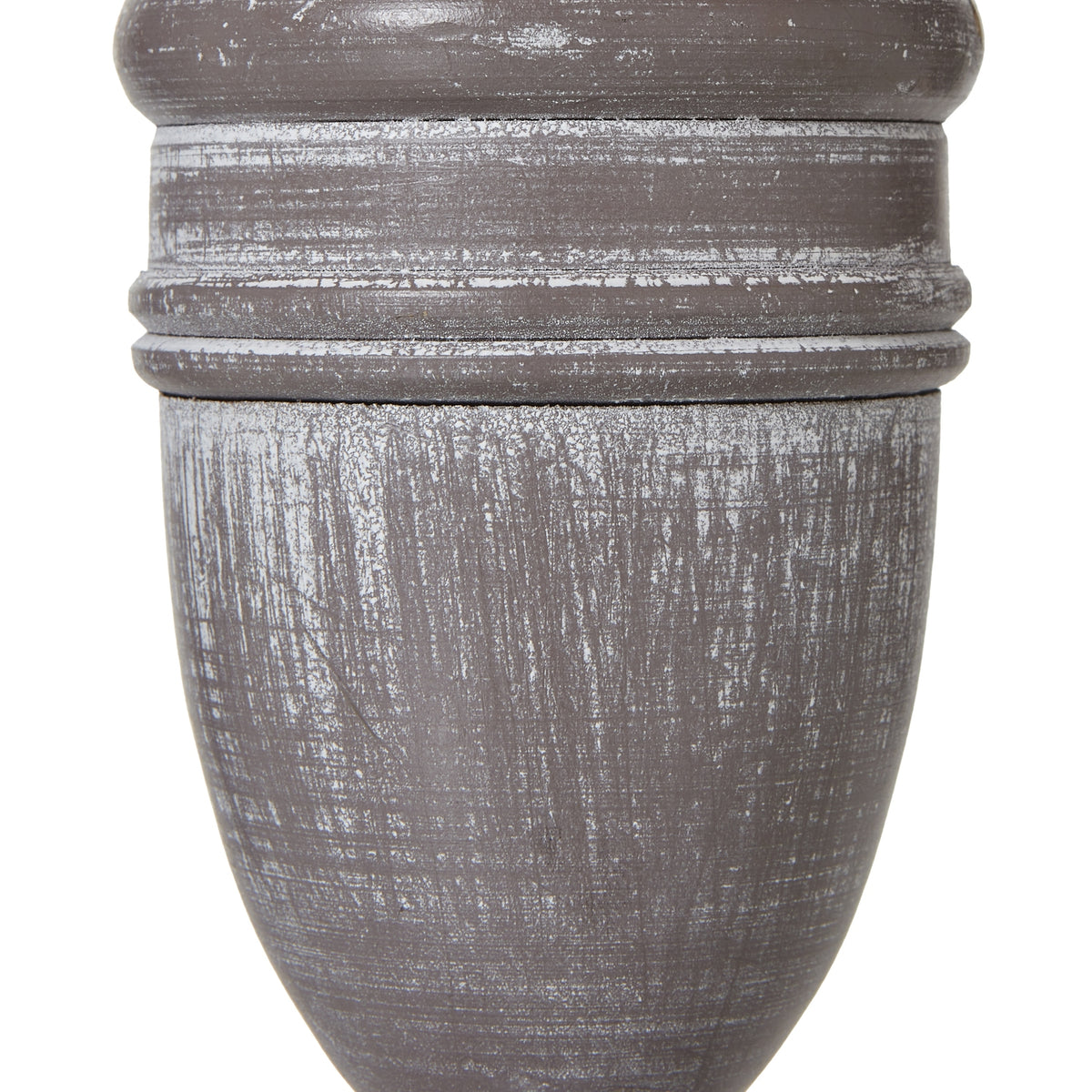 Close-up of the rounded lamp body showing rubbed white streaks over the grey-brown finish and raised horizontal bands