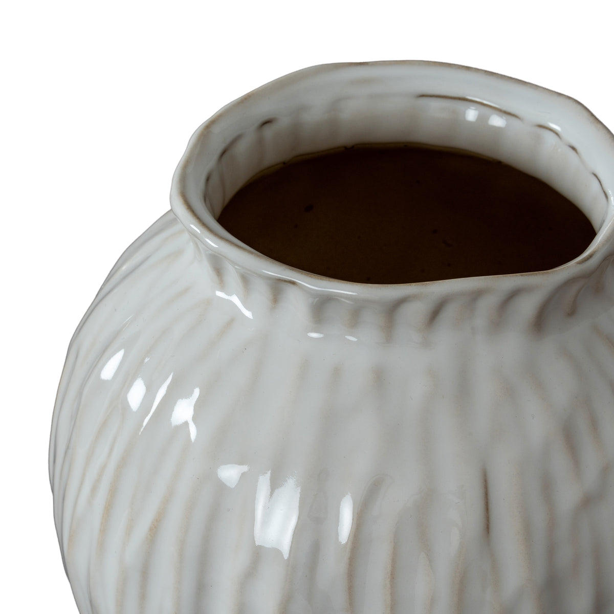 View down into the vase opening, showing the softly uneven rim and glossy ribbed shoulder.