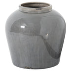 Grey crackle-glazed vase with a broad rounded body, low circular mouth and dark worn-looking patches at the rim and base.