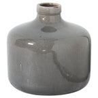 Grey ceramic vase on a white background, showing its broad rounded body, short neck, thick rolled rim and dark markings across the crackle glaze.