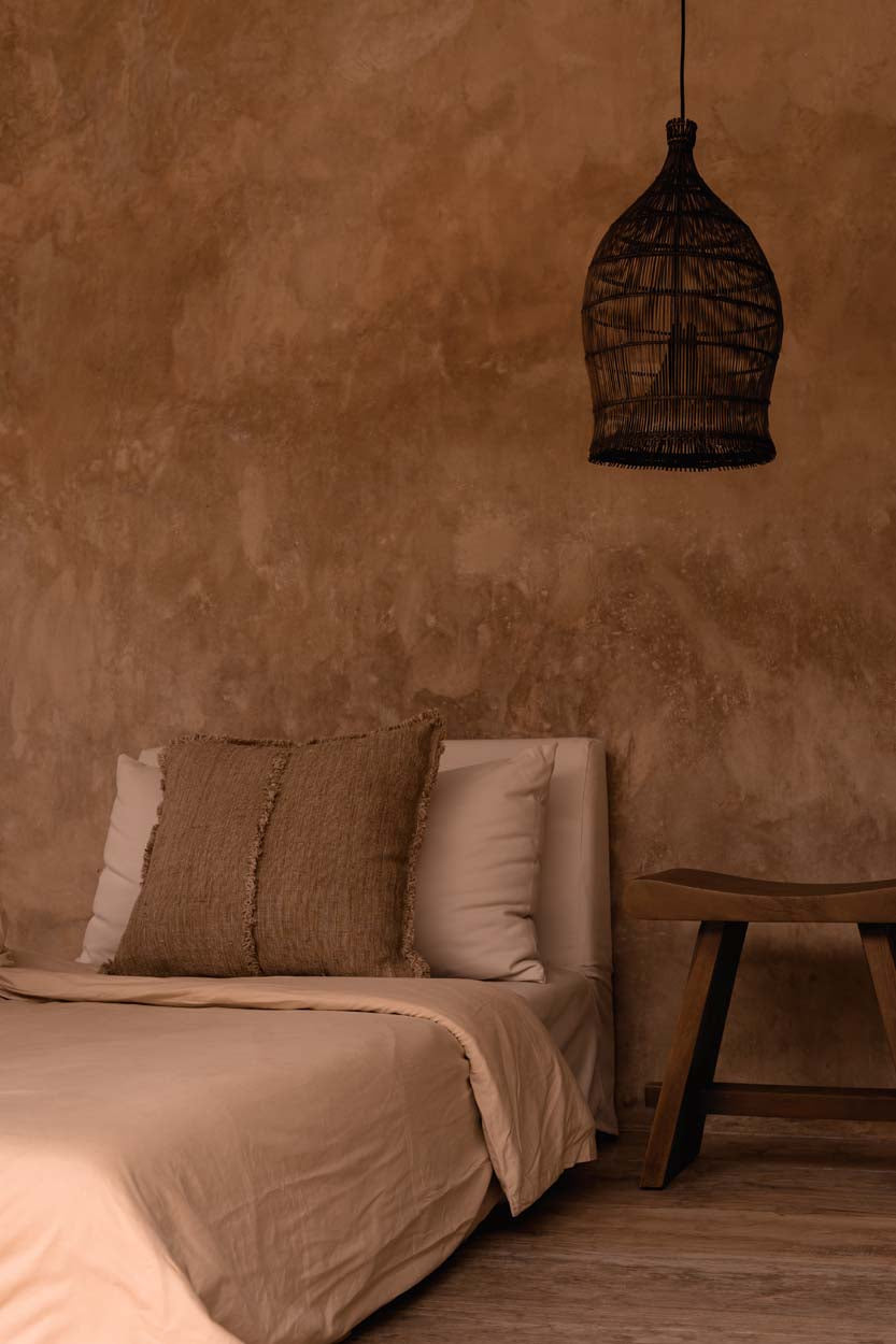 Woven Bell Bamboo Pendant Light – Dark Walnut, Small — styled beside a bed