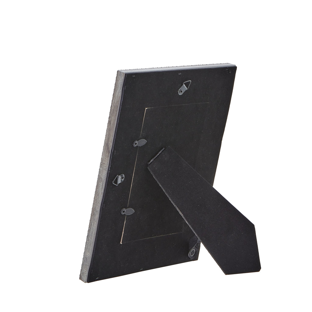 Rear view of the photo frame showing the dark back panel, turn tabs, hanging loops and open easel stand.