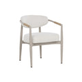 Three-quarter front view of a greige dining armchair with cream upholstered seat and curved back, tan woven arm wraps and slim legs on a white background.