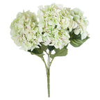 Full view of the green and cream artificial bouquet, with rounded flower heads, broad dark green leaves and stems gathered into a wrapped handle.