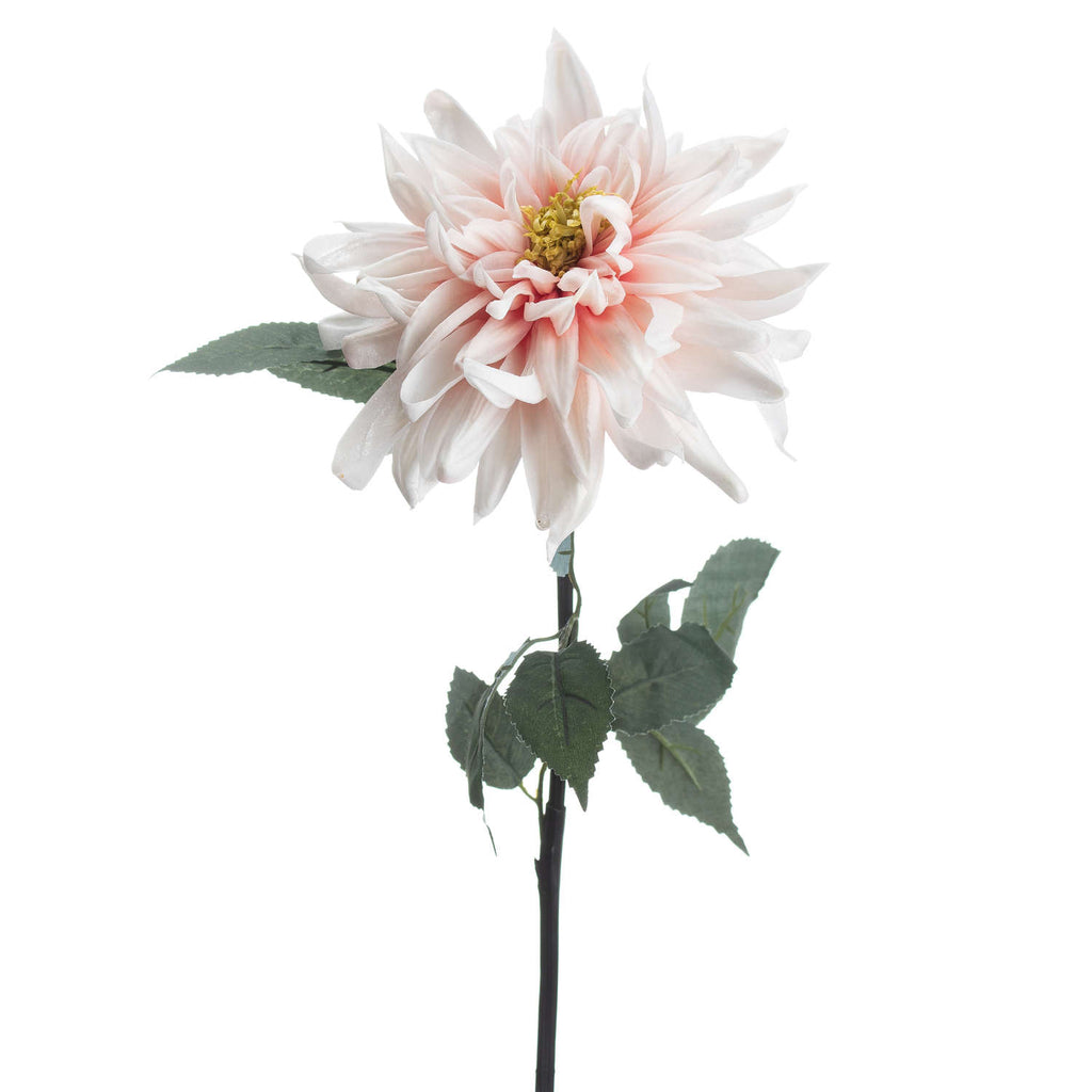 Close-up of the artificial dahlia's layered pale pink petals and yellow-green centre, with veined, serrated green leaves below.
